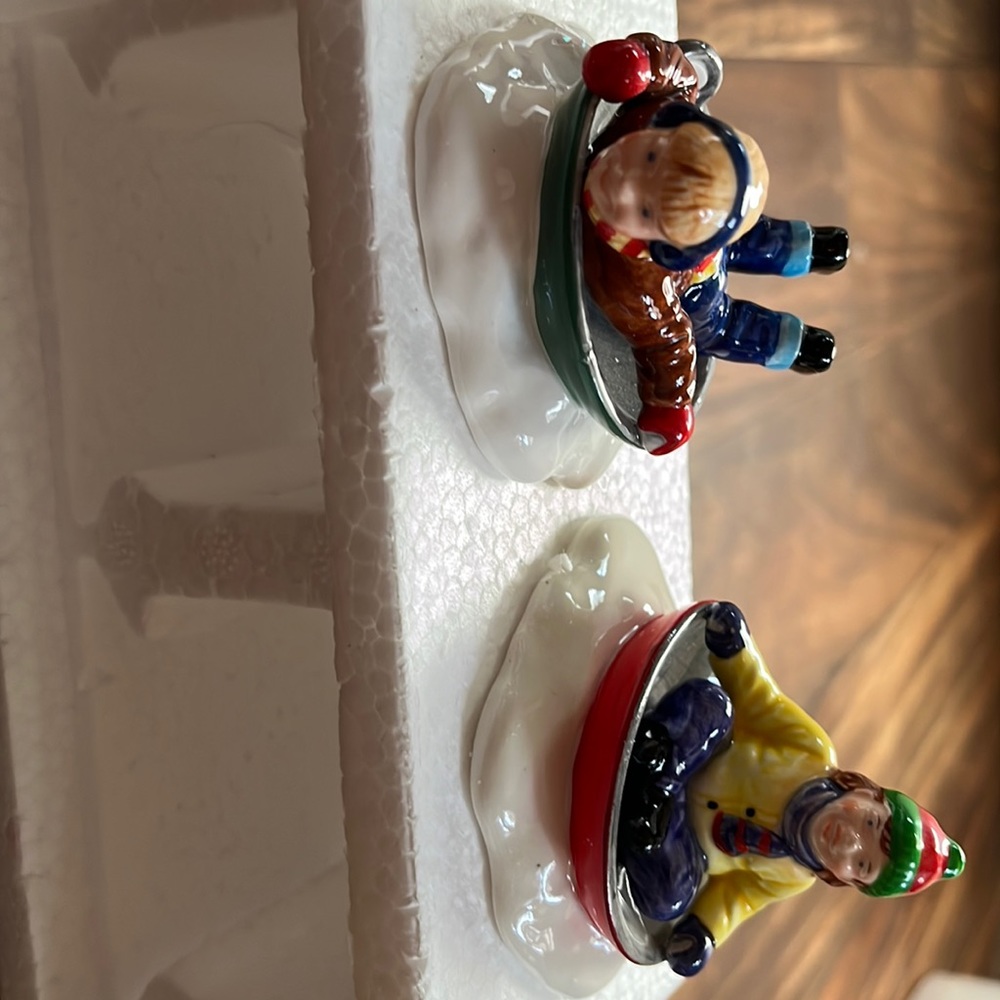 Department 56 snow village children snow sledding
